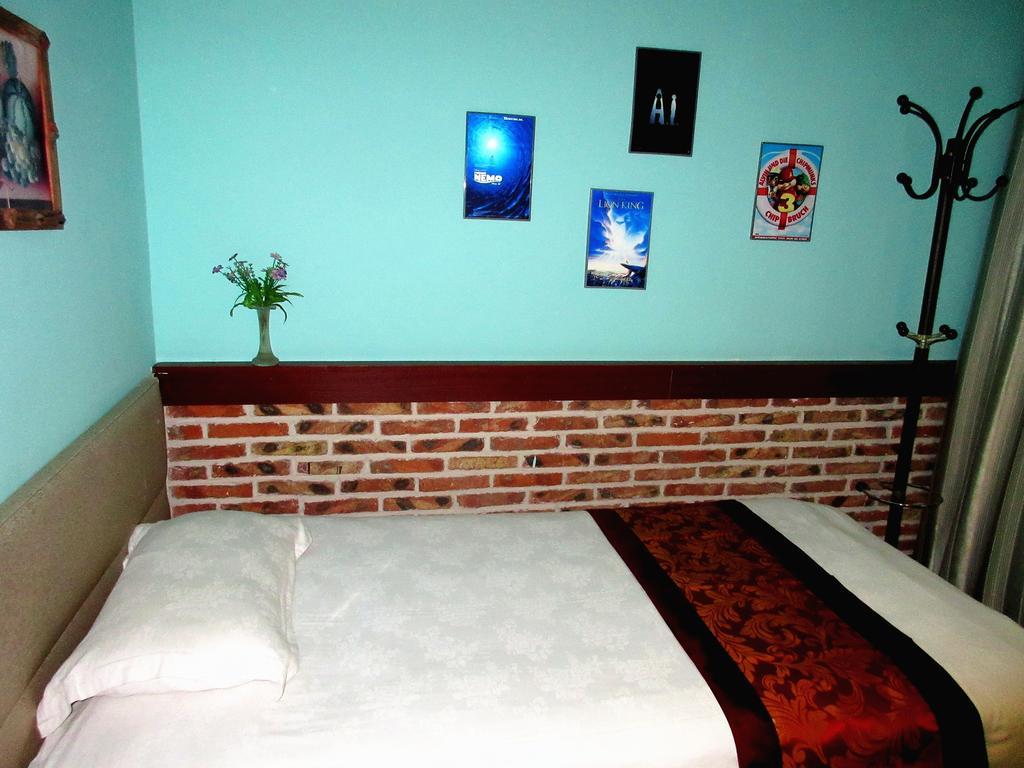 25°C Four Season Youth Hostel Qingdao Quarto foto