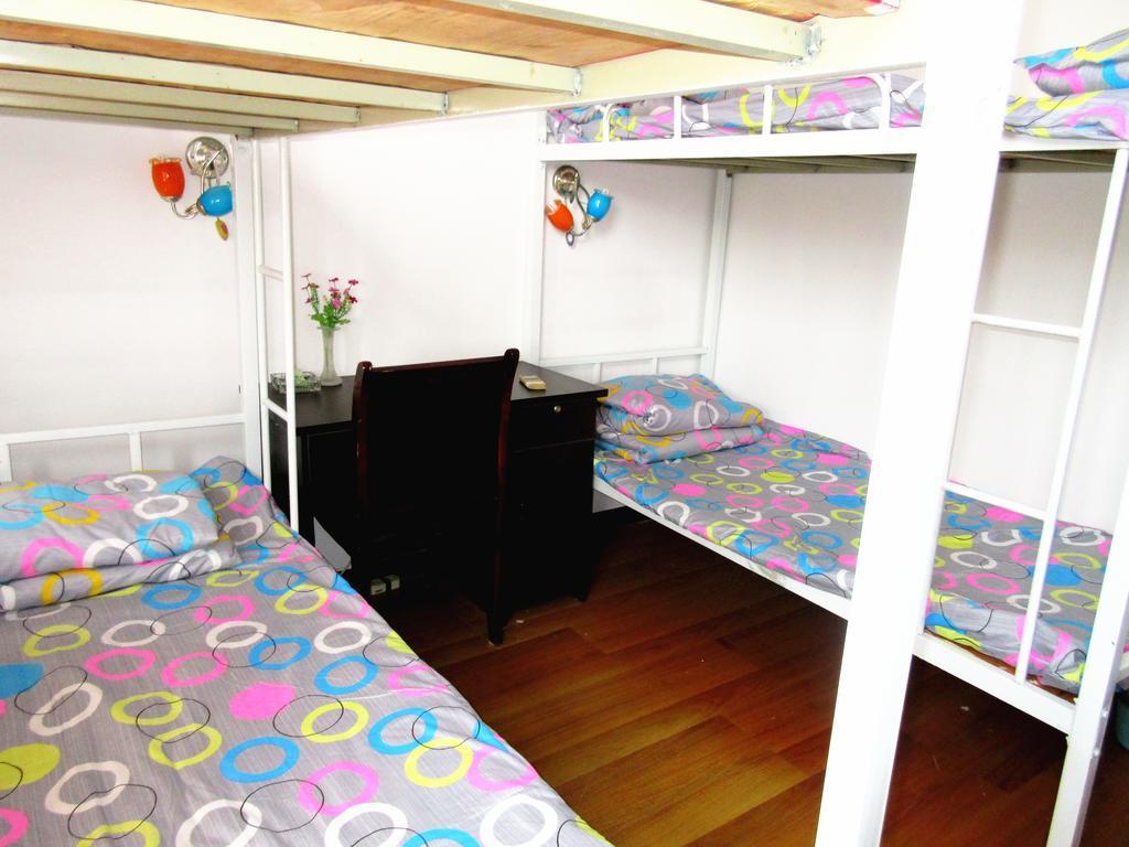 25°C Four Season Youth Hostel Qingdao Quarto foto