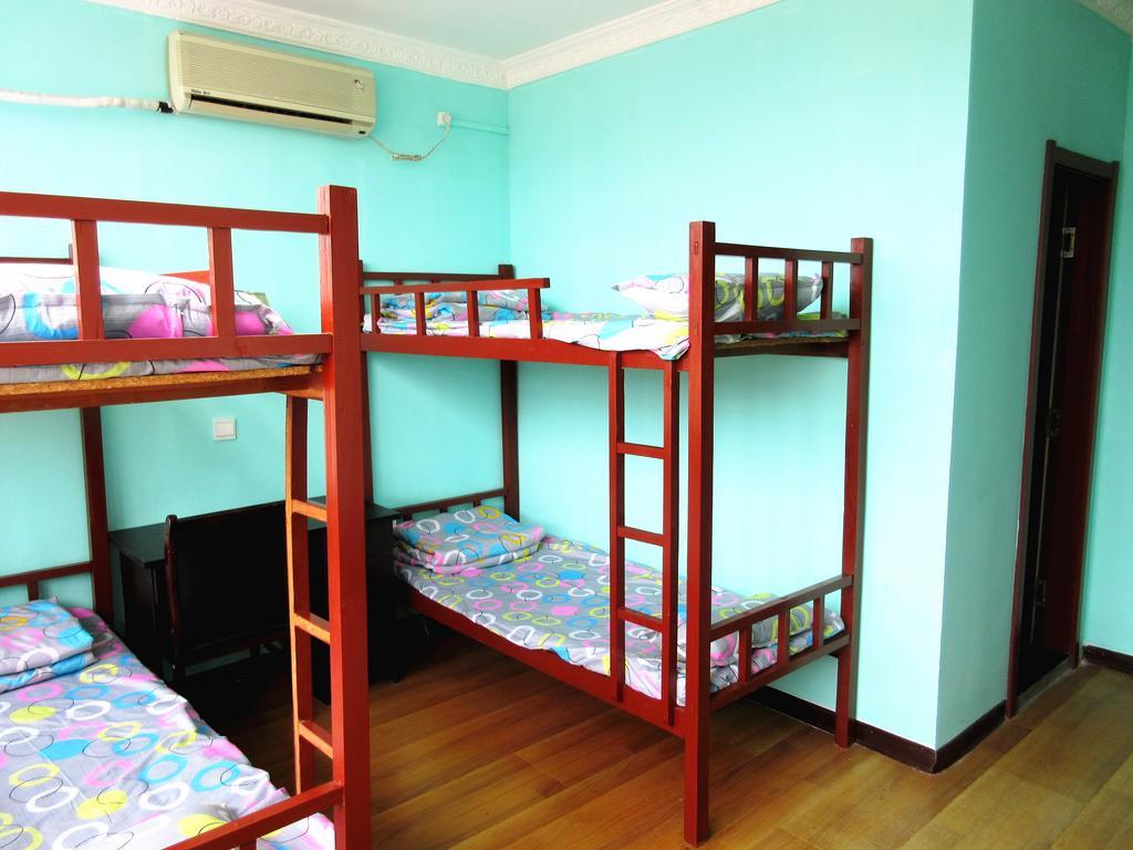 25°C Four Season Youth Hostel Qingdao Quarto foto