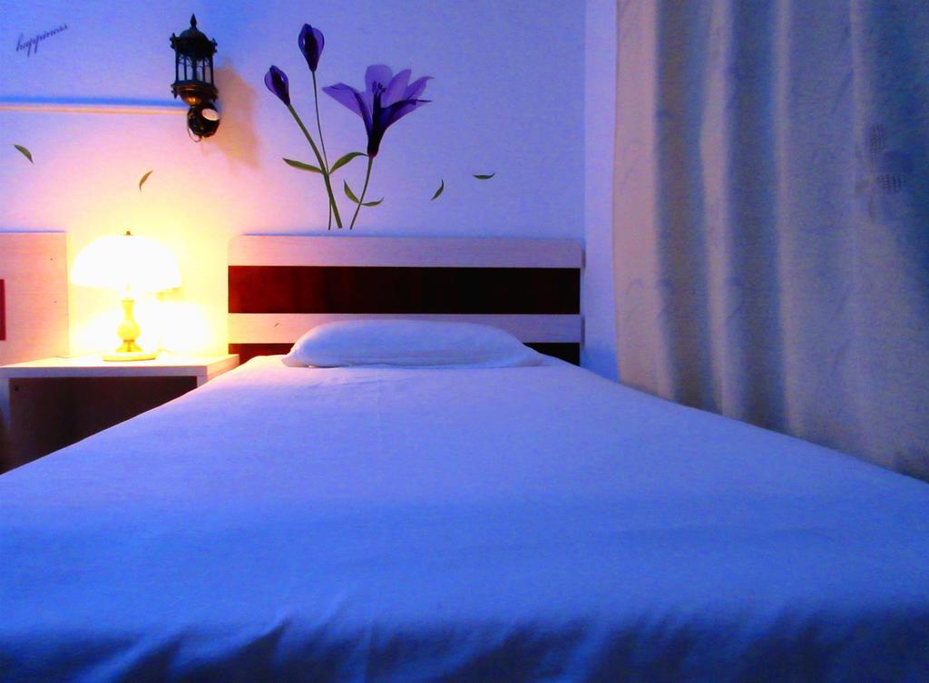 25°C Four Season Youth Hostel Qingdao Quarto foto