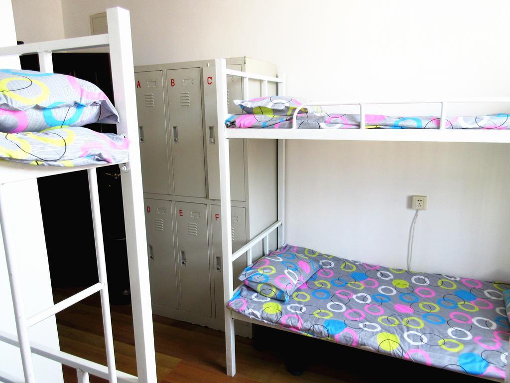 25°C Four Season Youth Hostel Qingdao Quarto foto