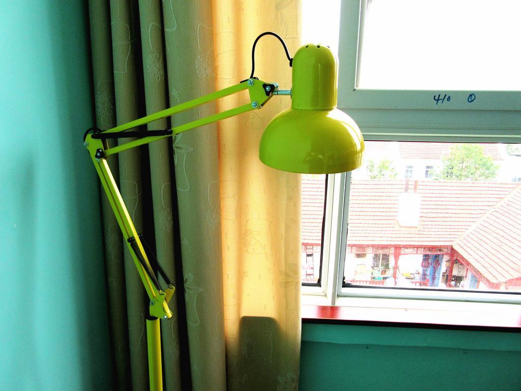 25°C Four Season Youth Hostel Qingdao Quarto foto