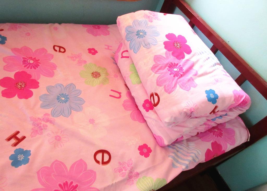 25°C Four Season Youth Hostel Qingdao Quarto foto